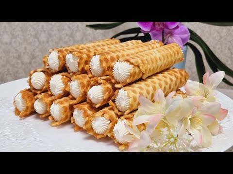 Crispy Wafer Rolls with Cream. The Pastries of Our Childhood
