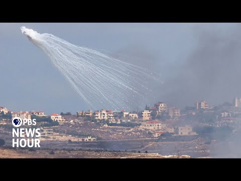 Israel continues raids in Lebanon while weighing response to Iran's missile attack