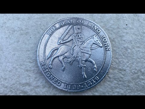 Sand casting a coin from aluminium cans ( petrobond ) the seal of king john