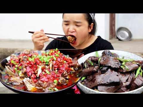 A Duo steaming 1kg pork ribs with pickled chili . finishing 2 bowls with it . so satisfying