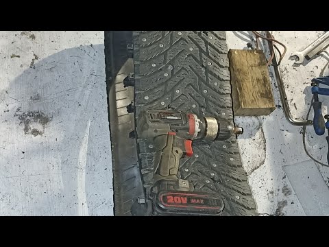 Homemade snowmobile with a Prius engine, making a track from a tire.