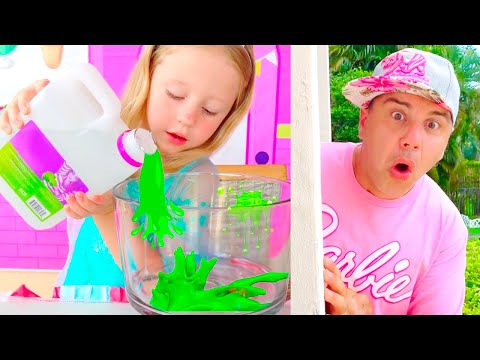 Nastya ve Baba parlak, renkli pırıltılarla balçık yapar