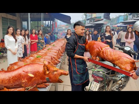 A lot of roast pigs are sold on this street and the sellers are all masters of knives