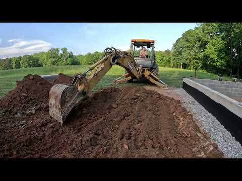 Back Filling The New Foundation On The Next Farm Building