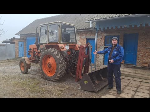 Review of a do-it-yourself rear-mounted loader for the YuMZ-6 AKL tractor. Soybean loading