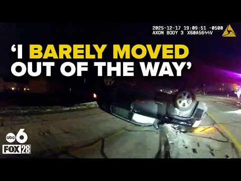 Driver hits police cruiser, narrowly misses officer standing outside