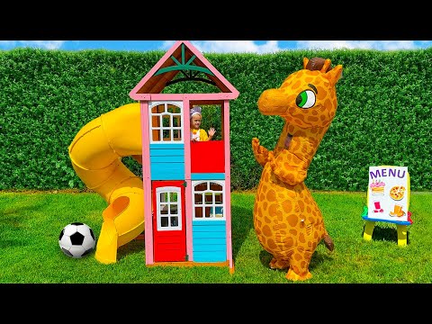 Chris plays in the children's cafe and feeds the animals