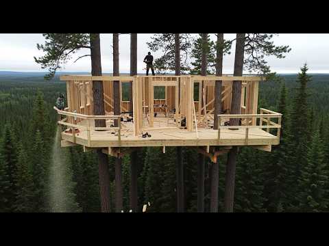 This man is building a giant 10-meter-high treehouse to protect himself from wild animals!