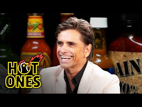 John Stamos Falls Out of His Chair While Eating Spicy Wings | Hot Ones