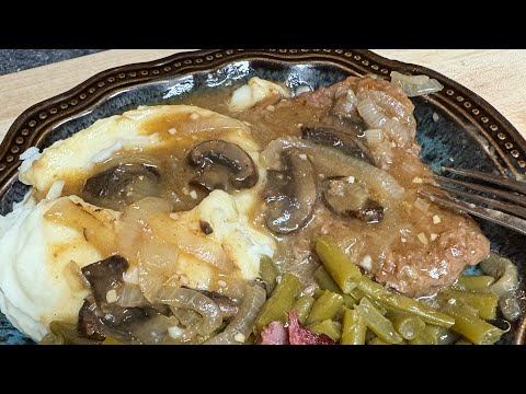 Fork Tender Cube Steak with Onion and Mushroom Gravy