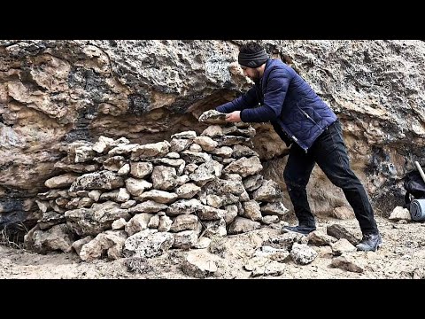 Building a shelter resistant to strong winds. camping in the mountains