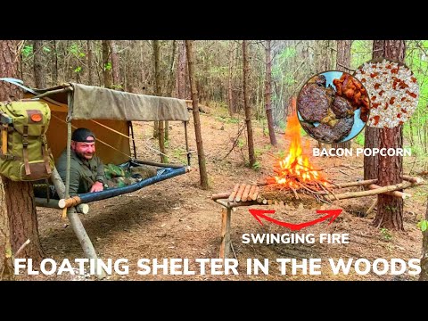Solo Overnight Building a Suspended Shelter and Pivoting Fire In The Woods and Grilled Bacon Ribeye