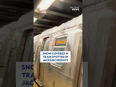 Snow-covered M train spotted in Jackson Heights