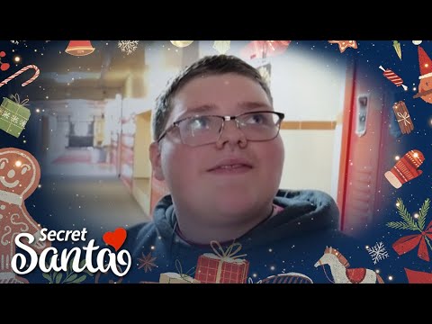 Young man born without feet is confused when we show up at school with a Secret Santa gift
