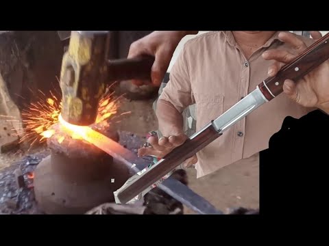 The iron artist in action makes the sword sharpened of the circle steel #14