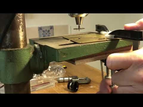 Clock rebushing and proposal for finding the position of the original pivot holes