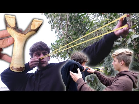 Teaching My cousin How to shoot a slingshot