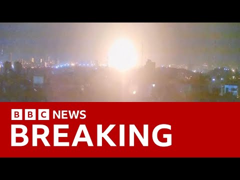 Israel announces strikes on Iran's nuclear sites as blasts heard across country | BBC News