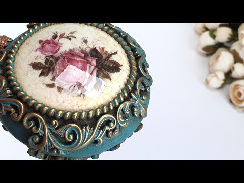 Christmas decoration in baroque style. Decoupage with rice paper. Modelling with polymer clay, Fimo