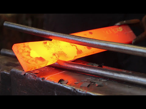 Blacksmithing - A LESSON IN PUNCHING HOLES making a bolster plate