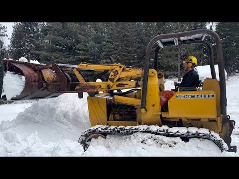 Bush Camp Snow Removal With JohnDeere 450