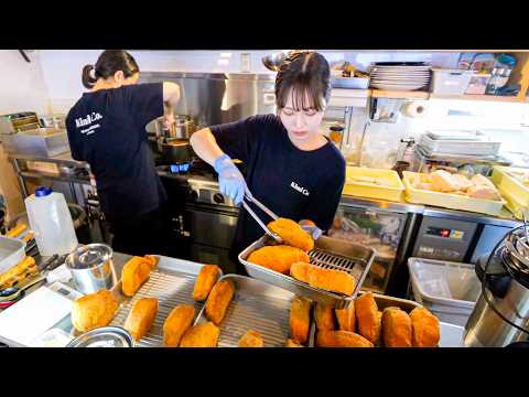 バリバリ働く看板娘が躍動する驚愕の極厚とんかつに客が唸る。