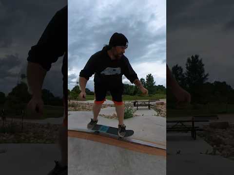 50-50 on a rainbow rail #skateboarding