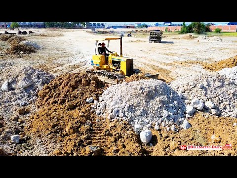 Komatsu Bulldozer Power! Perfect land Leveling as Dump Trucks Feed Continuous Road Base