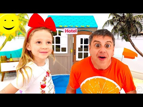 Nastya finge jugar el juego del hotel con papá