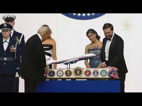 Donald Trump dances with sword after he and JD Vance cut cake at Commander in Chief inaugural ball