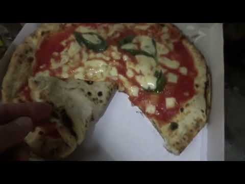 Pizzeria Decumani in Naples, Italy... sloppy tomato soup kinda pizza