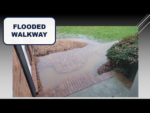 Replacing a sunken and flooded walkway with correct slope