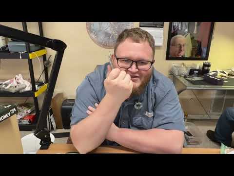 Having a coin shop owner tell me what my coins are worth.