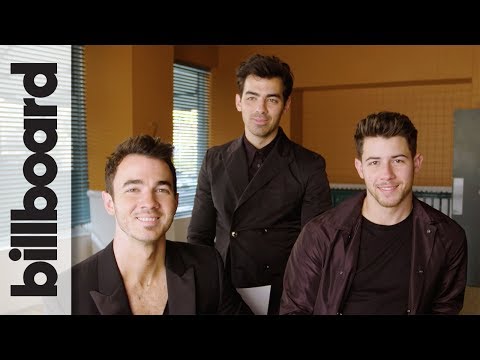 Jonas Brothers Joke About Pranking Each Other & Laugh at Their 2000s Haircuts | Billboard