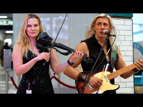 I Ask if She Knows Chris Isaac and This Violinist Shocks The Crowd 