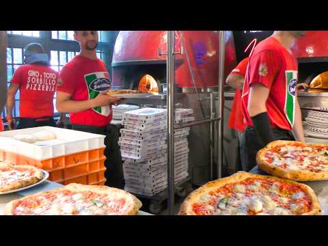 Inside the Historic Sorbillo Pizzeria in the Heart of Naples, Italy