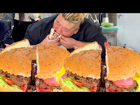 Monkey's 10  giant beef burger  packed with fixings  feeds 3  one bite at a time! [Fat Monkey Boy]