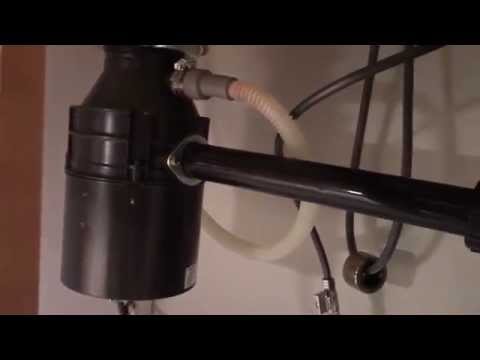 How to fix a garbage disposal - No Power / Humming / Repair