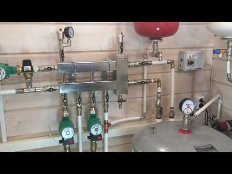 Heating in a private home. Hydronic arrow for hydronic underfloor heating, radiators, and hot wat...