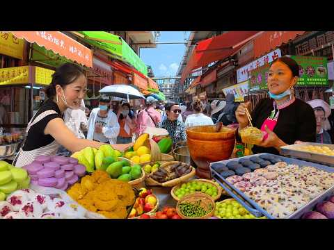 中國雲南昆明最大菜市場，超多美食小吃和稀奇的水果丨雲南火腿和特色牛乾巴丨金黃酥脆的牛肉餅丨焦香軟糯的餌塊丨新鮮玫瑰作餡的現烤鮮花餅丨鬆軟酥脆雙重口感的脆皮米糕丨傣味燒茄子和檸檬魚丨色彩斑斕的七彩糯米飯