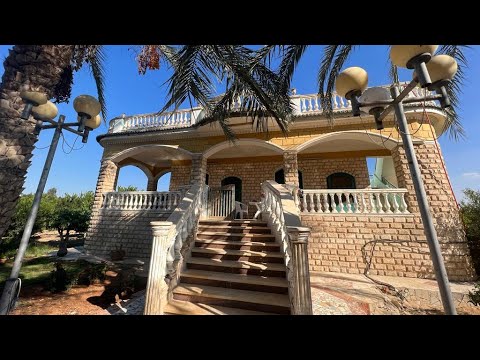 مزرعة نموذجية ١٧ فدان ري نيلي علي طريق مصر اسماعيلية الصحراوي بها فيلا و حوض مياه و شجر موالح و مشمش