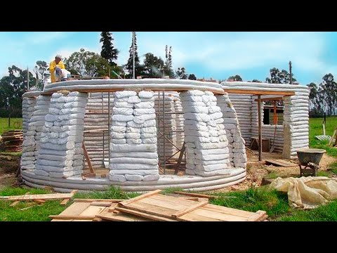 Man builds a cheap house out of sacks. New technology. Step by step construction process