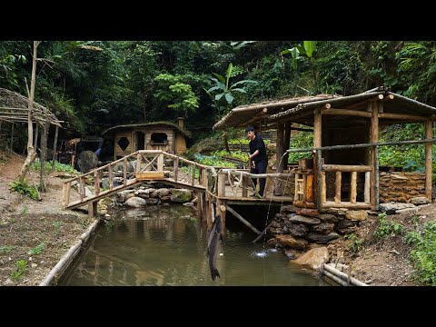 Building a kitchen sink, bringing groundwater in for use. Fishing and cooking in the deep forest.