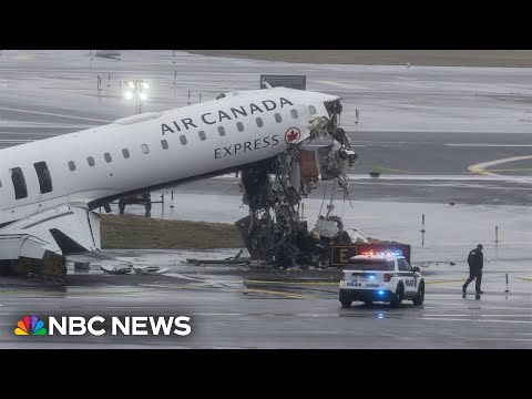 One runway reopens at LaGuardia Airport after fatal collision 