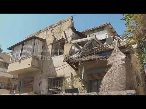 Iranian missile strike in central Israel severely damages building, no injuries reported