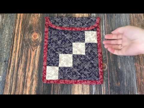 Textile envelope in patchwork technique. cross stitch project bag