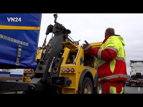 VN24 - Truck on truck collision in a traffic jam - needs two tow trucks to pull away