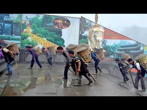 China's last mountain porters carry 2 tons daily, hide job from kids. How much do they earn?