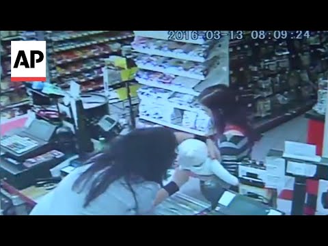 Clerk grabs baby from woman before she collapses