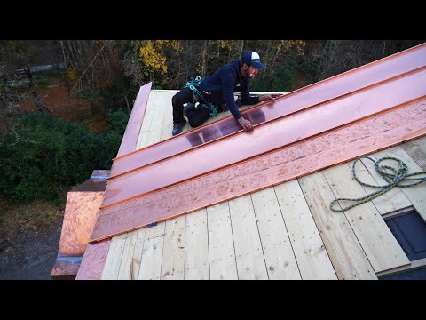 Copper standing seam panel time.